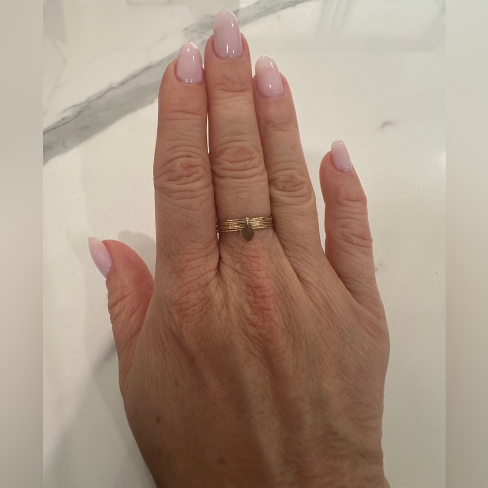 Vintage solid 14k ring with dangle heart charm